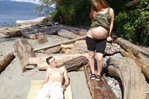 A naked pregnant babe Image 1